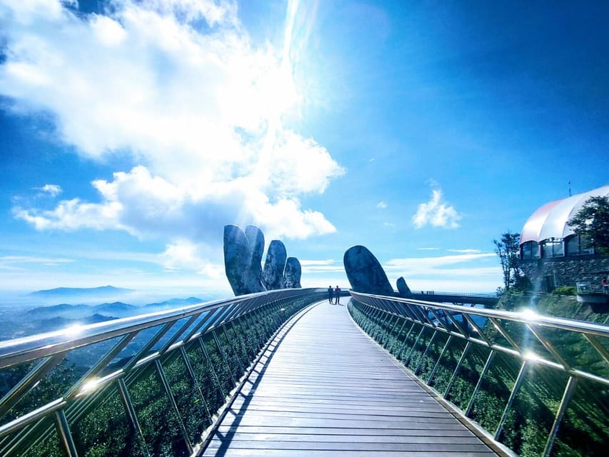 Ba Na Hills Golden Bridge Deluxe Max 12pax Group from DaNang - French Village: street music, performances, and named landmarks