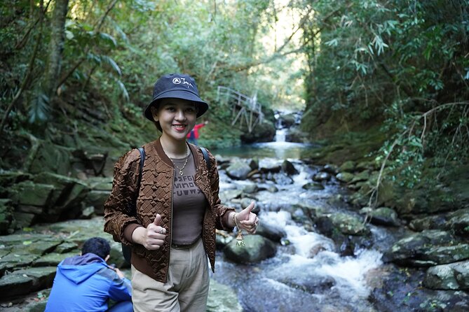 Bach Ma National Park trekking daily tour from Da Nang, Hoi An - Do Quyen Waterfall: wet feet, real steps, and an optional tough edge