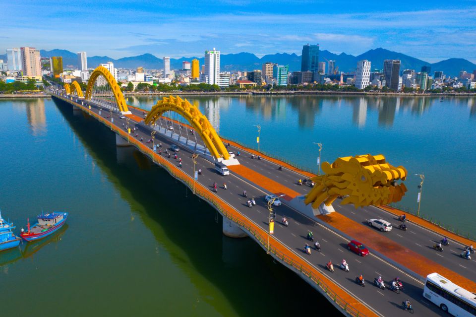 Da Nang: Private City Tour by Scooter with Ao dai Lady Rider - Han Market, bridges, and the slower city scenes between