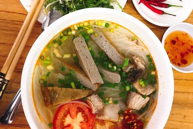 DaNang Night Foodie Tour-Sighseeing with Aodai Lady Rider Private - Weather and the car switch: the one drawback to plan for