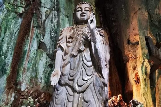 Guided Tour to Marble Mountains & Hoi An Walking Tour , Night Market, Boat Ride - Japanese Covered Bridge and lantern magic at the right moment
